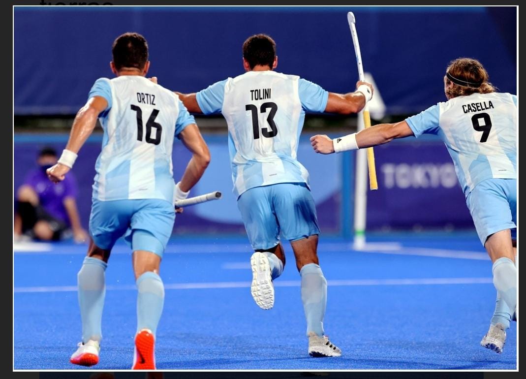 https://upload.wikimedia.org/wikipedia/commons/9/9a/Field_hockey_at_the_2020_Summer_Olympics_-_Argentina_%28men%29.jpg