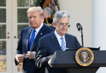 Jerome Powell, governor of the U.S. Federal Reserve and President Donald Trump's nominee as chairman of the Federal Reserve, speaks as Trump listens during a nomination announcement in the Rose Garden of the White House in Washington, D.C., U.S., on Thursday, Nov. 2, 2017. If approved by the Senate, the 64-year-old former Carlyle Group LP managing director and ex-Treasury undersecretary would succeed Fed Chair Janet Yellen. Photographer: Olivier Douliery/Bloomberg