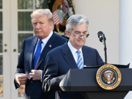 Jerome Powell, governor of the U.S. Federal Reserve and President Donald Trump's nominee as chairman of the Federal Reserve, speaks as Trump listens during a nomination announcement in the Rose Garden of the White House in Washington, D.C., U.S., on Thursday, Nov. 2, 2017. If approved by the Senate, the 64-year-old former Carlyle Group LP managing director and ex-Treasury undersecretary would succeed Fed Chair Janet Yellen. Photographer: Olivier Douliery/Bloomberg