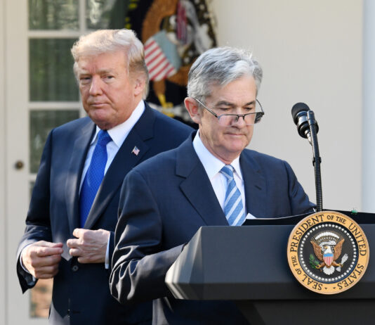 Jerome Powell, governor of the U.S. Federal Reserve and President Donald Trump's nominee as chairman of the Federal Reserve, speaks as Trump listens during a nomination announcement in the Rose Garden of the White House in Washington, D.C., U.S., on Thursday, Nov. 2, 2017. If approved by the Senate, the 64-year-old former Carlyle Group LP managing director and ex-Treasury undersecretary would succeed Fed Chair Janet Yellen. Photographer: Olivier Douliery/Bloomberg